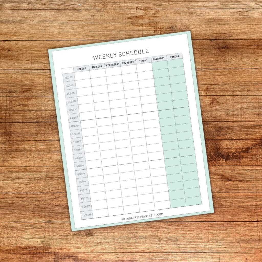printable daily calendar with time slots on a table
